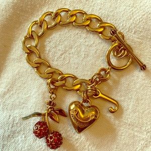 Juicy Couture Charm Bracelet with Cherry Charm.